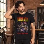 Modelo con playera negra de Nirvana en taller de ladrillo
